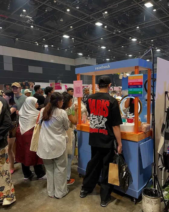 Shoppers crowding the booth at Twilight, June 2025